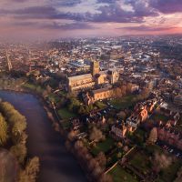 A beautiful drone shot of Worcester during sunrise; useful for film and TV.