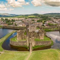 A wonderful drone shot of Caerphilly castle in the summer during the construction services.