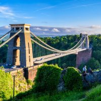 Bristol suspension bridge at sunset with climbers during an infrastructure drone shoot.