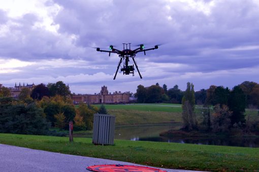 An airborne drone at a national trust park, producing photogrammetry images.