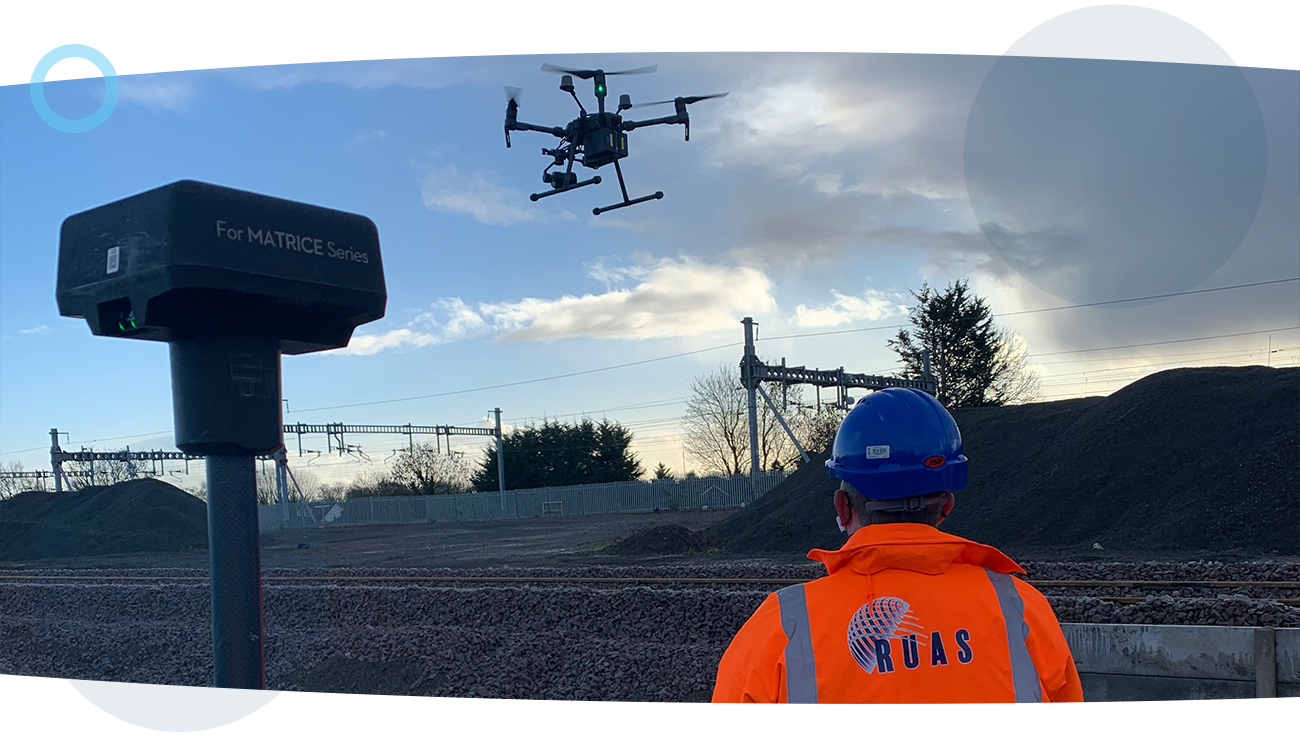 An airborne drone at a power plant, producing 3D orthomosaic imagery during a RUAS service.