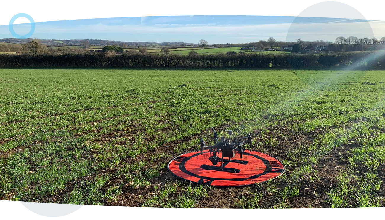 A drone preparing to go airborne during a topographical survey.