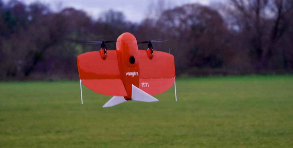A close up shot of a wingtra drone producing a photogrammetry image whilst airborne.