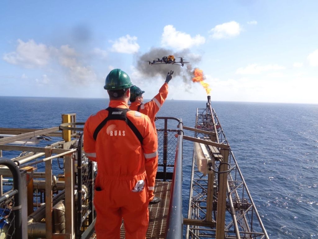 A licensed drone being taken-off to inspect an oil rig as apart of offshore services.