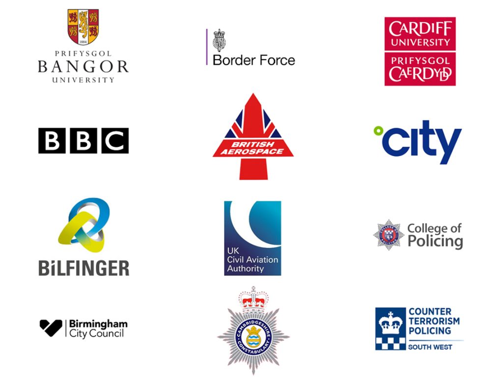 List of brands partnered with RUAS: Bangor University, Border Force, Cardiff University, BBC, British Aerospace, city, Bilfinger, UK CAA, College of Policing, Birmingham City Council, Cambridgeshire Constabulary, Counter terrorism policing.