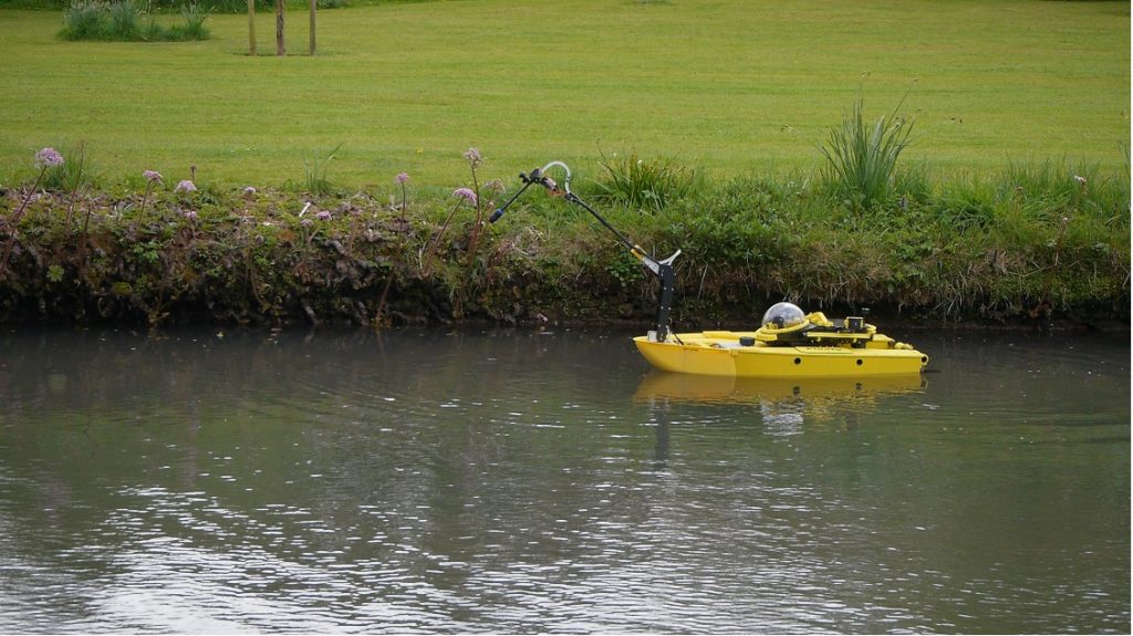 The waterborne Surface Hydro ROV “SHROV” camera extending out to view a section of the canal.