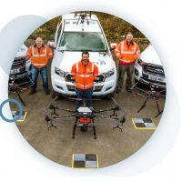 Circular image of the RUAS team, with UK CAA recognised qualifications, and their drones.