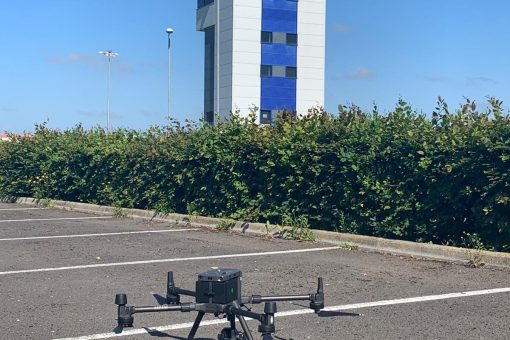 A drone preparing for take off by a drone tower, underlines the importance of flying a drone within an FRZ.